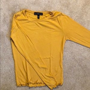 Yellow long sleeve with wavy bottom